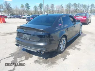 2014 Audi S4 Premium Plus with VIN WAUBGAFL9EA089416, listed as a IAAI auction lot 41879427 with 121,448 mi miles. Bid and sale history available at carsss.com. Image 4.