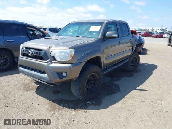 2015 Toyota Tacoma PreRunner with VIN 3TMJU4GN8FM185826, listed as a IAAI auction lot 42181952 with 229,936 mi miles and . Bid and sale history available at DreamBid. Image 2.