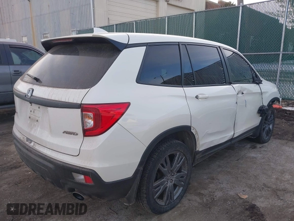 2019 Honda Passport EX-L with VIN 5FNYF8H5XKB008904, listed as a IAAI auction lot 41440706 with 57,317 mi miles and . Bid and sale history available at DreamBid. Image 4.