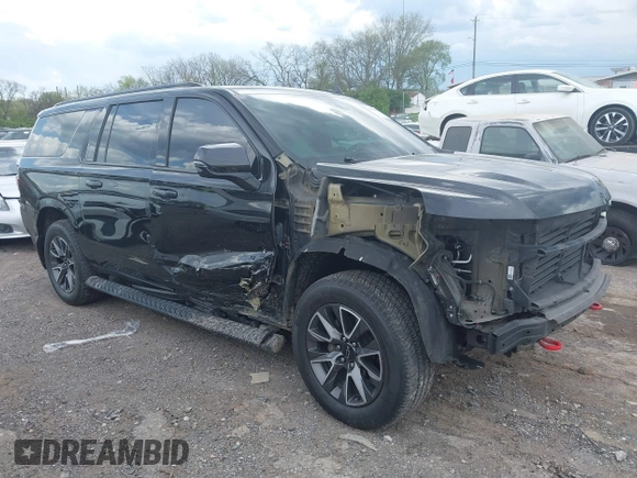 2022 Chevrolet Suburban z VIN 1GNSKDKL5NR218592, wystawiony jako IAAI lot #41989302 z przebiegiem 184 080 mil mil oraz . Historia ofert i sprzedaży dostępna na DreamBid. Obrazek 13.
