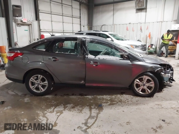 2013 Ford Focus SE with VIN 1FADP3F22DL270686, listed as a IAAI auction lot 40560064 with 84,681 mi miles and . Bid and sale history available at DreamBid. Image 14.