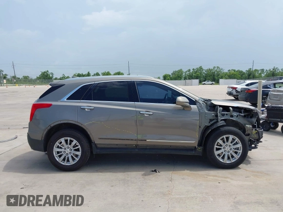 2018 Cadillac XT5 FWD with VIN 1GYKNARS5JZ145739, listed as a IAAI auction lot 42443337 with 50,917 mi miles and . Bid and sale history available at DreamBid. Image 13.