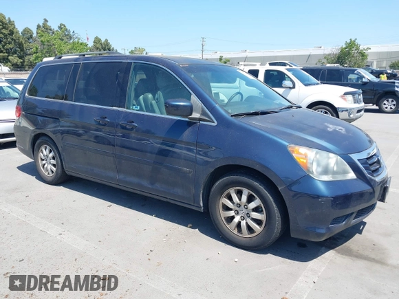2009 Honda Odyssey EX-L with VIN 5FNRL386X9B409419, listed as a IAAI auction lot 42177197 with 190,827 mi miles. Bid and sale history available at carsss.com. Image 1.
