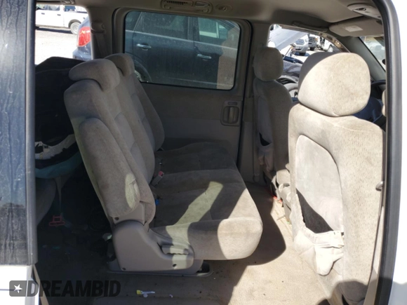 2004 Kia Sedona LX with VIN KNDUP131046585706, listed as a Copart auction lot 74973304 with 107,130 mi miles and Salvage Title. Bid and sale history available at carsss.com. Image 11.