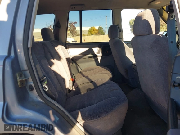 1996 Jeep Grand Cherokee Laredo with VIN 1J4FX58S8TC169575, listed as a IAAI auction lot 40971134 with 152,116 mi miles. Bid and sale history available at carsss.com. Image 8.