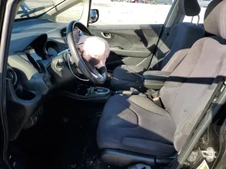 2012 Honda Fit Sport with VIN JHMGE8H52CS003715, listed as a Copart auction lot 63113204 with 79,744 mi miles and Salvage Title. Bid and sale history available at carsss.com. Image 7.