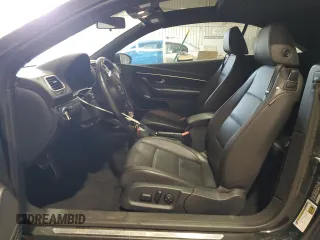 2014 Volkswagen Eos Komfort with VIN WVWBW8AH8EV000316, listed as a Copart auction lot 52208485 with 124,338 mi miles and Salvage Title. Bid and sale history available at DreamBid. Image 7.