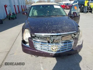 2008 Cadillac DTS 1SC z VIN 1G6KD57Y48U182797, wystawiony jako IAAI lot #41950105 z przebiegiem 96 274 mil mil oraz . Historia ofert i sprzedaży dostępna na DreamBid. Obrazek 6.