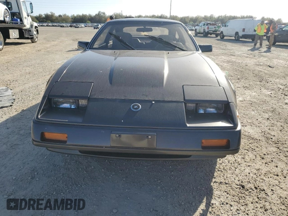 1986 Nissan 300ZX z VIN JN1HZ16S9GX094097, wystawiony jako Copart lot #75251134 z przebiegiem Nie podano mil oraz Szkoda całkowita • Salvage title. Historia ofert i sprzedaży dostępna na DreamBid. Obrazek 5.