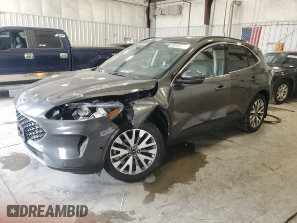 2020 Ford Escape Titanium Hybrid with VIN 1FMCU9DZ7LUA95938, listed as a Copart auction lot 58720595 with 49,963 mi miles and Salvage title. Bid and sale history available at DreamBid. Image 1.