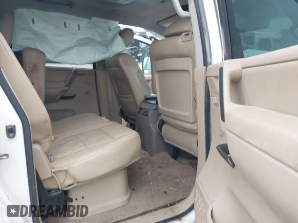 2012 Nissan Titan SL with VIN 1N6AA0EC7CN311109, listed as a IAAI auction lot 41420110 with 209,731 mi miles and . Bid and sale history available at DreamBid. Image 8.