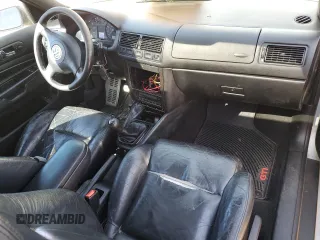 2000 Volkswagen GTI с VIN WVWDE21J2YW731317, выставлен на аукционе Copart как лот 77158614 с пробегом 211 655 миль миль и Чистый • Clean title. История ставок и продаж доступна на DreamBid. Изображение 8.