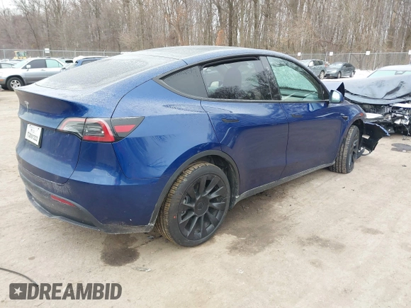 2025 Tesla Model Y Long Range with VIN 7SAYGDED9SF248370, listed as a IAAI auction lot 41336869 with 2,499 mi miles and . Bid and sale history available at DreamBid. Image 4.