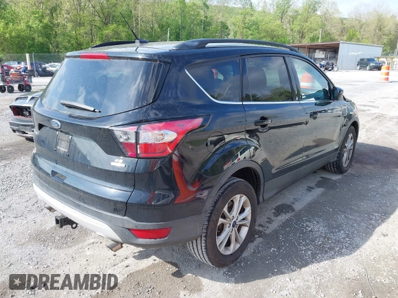 2017 Ford Escape SE with VIN 1FMCU9G91HUB56073, listed as a IAAI auction lot 42130463 with 94,275 mi miles and . Bid and sale history available at carsss.com. Image 4.