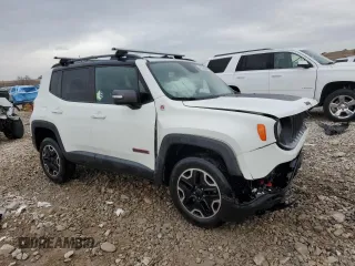 2016 Jeep Renegade Trailhawk with VIN ZACCJBCT9GPE01207, listed as a Copart auction lot 87396064 with 117,609 mi miles and Salvage Title. Bid and sale history available at carsss.com. Image 4.