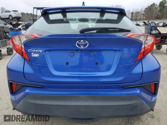2019 Toyota C-HR XLE with VIN NMTKHMBX4KR072109, listed as a Copart auction lot 47124985 with 142,969 mi miles and Salvage Title. Bid and sale history available at carsss.com. Image 6.
