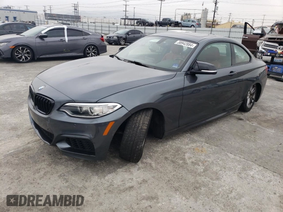 2016 BMW 2 Series M235i with VIN WBA1J7C52GV359572, listed as a Copart auction lot 38942884 with 65,456 mi miles. Bid and sale history available at carsss.com. Image 1.