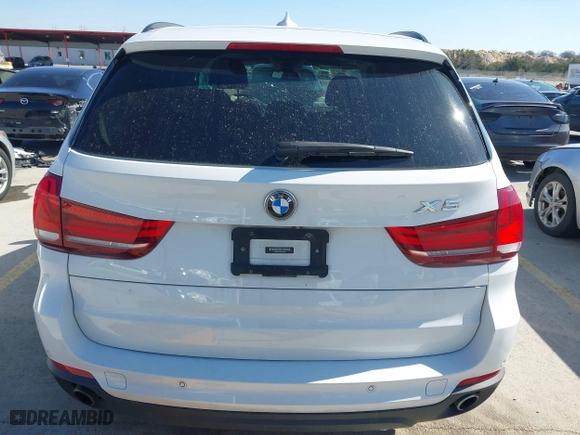 2016 BMW X5 xDrive35i with VIN 5UXKR0C56G0P34365, listed as a IAAI auction lot 41588869 with 105,250 mi miles. Bid and sale history available at carsss.com. Image 16.