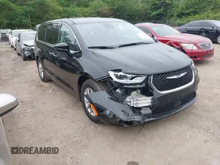 2024 Chrysler Pacifica Touring L with VIN 2C4RC1BG9RR162341, listed as a IAAI auction lot 42217412 with 31,628 mi miles and . Bid and sale history available at DreamBid. Image 1.