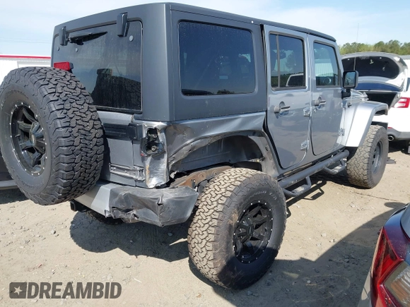 2015 Jeep Wrangler Unlimited Sahara with VIN 1C4BJWEG2FL558860, listed as a IAAI auction lot 41937360 with 113,627 mi miles. Bid and sale history available at carsss.com. Image 4.