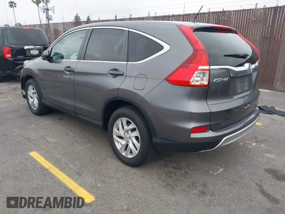 2015 Honda CR-V EX with VIN 3CZRM3H51FG704087, listed as a IAAI auction lot 42074521 with 74,610 mi miles and . Bid and sale history available at carsss.com. Image 3.