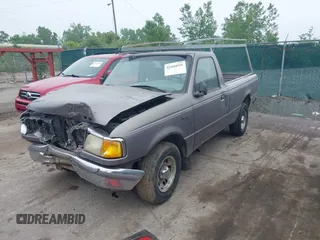 1997 Ford Ranger XLT z VIN 1FTCR10A1VTA93179, wystawiony jako IAAI lot #42444951 z przebiegiem 201 990 mil mil oraz . Historia ofert i sprzedaży dostępna na DreamBid. Obrazek 2.