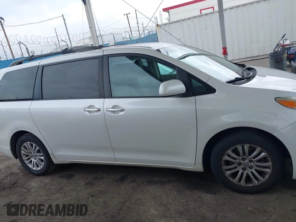 2015 Toyota Sienna XLE with VIN 5TDYK3DC5FS640102, listed as a IAAI auction lot 41885194 with 119,972 mi miles. Bid and sale history available at carsss.com. Image 13.