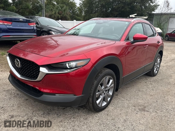 2024 Mazda CX-30 S Preferred z VIN 3MVDMBCM0RM614880, wystawiony jako Copart lot #86984534 z przebiegiem 1 967 mil mil oraz Czysty tytuł • Clean title. Historia ofert i sprzedaży dostępna na DreamBid. Obrazek 2.