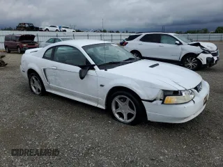 2000 Ford Mustang GT with VIN 1FAFP42X5YF124562, listed as a Copart auction lot 56029505 with 85,451 mi miles and Salvage Title. Bid and sale history available at DreamBid. Image 4.