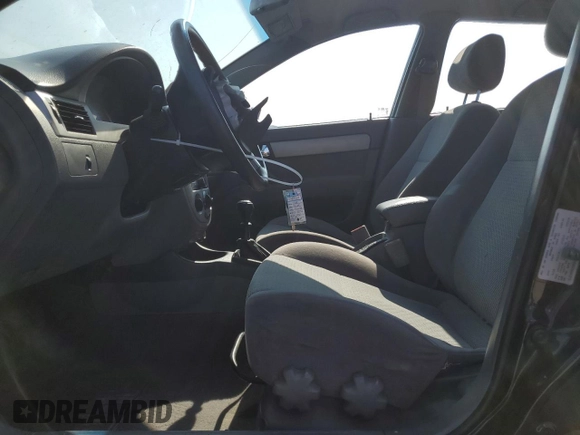 2008 Suzuki Forenza z VIN KL5JD56ZX8K974392, wystawiony jako Copart lot #64694854 z przebiegiem 145 180 mil mil oraz Szkoda całkowita • Salvage title. Historia ofert i sprzedaży dostępna na DreamBid. Obrazek 7.