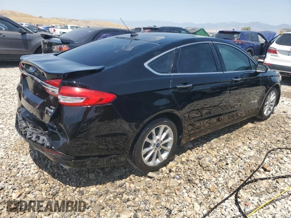 2017 Ford Fusion Hybrid SE with VIN 3FA6P0LU1HR266939, listed as a Copart auction lot 61018305 with 121,293 mi miles and Salvage title. Bid and sale history available at DreamBid. Image 3.