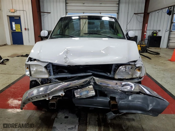 1999 Ford F-150 Work Series with VIN 1FTRX17W7XNC02138, listed as a Copart auction lot 73436294 with 0 mi miles and Salvage Title. Bid and sale history available at carsss.com. Image 5.