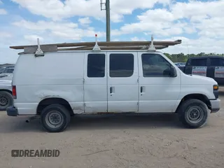 2013 Ford Econoline Cargo Commercial with VIN 1FTSE3EL4DDA38215, listed as a IAAI auction lot 41627924 with 181,821 mi miles. Bid and sale history available at carsss.com. Image 13.