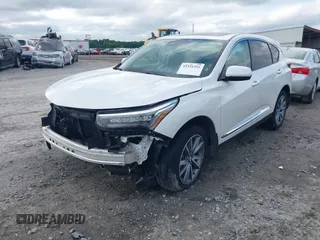 2020 Acura RDX Advance with VIN 5J8TC2H79LL033018, listed as a IAAI auction lot 42331295 with 53,015 mi miles and . Bid and sale history available at DreamBid. Image 18.