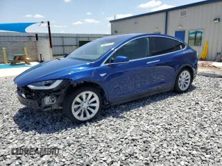 2016 Tesla Model X 70D z VIN 5YJXCAE29GF001522, wystawiony jako Copart lot #56571115 z przebiegiem 129 924 mil mil oraz Szkody całkowita. Historia ofert i sprzedaży dostępna na DreamBid. Obrazek 1.