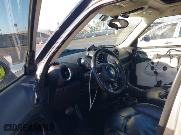 2013 MINI Countryman S ALL4 with VIN WMWZC5C58DWP30774, listed as a IAAI auction lot 41637209 with 101,540 mi miles and . Bid and sale history available at DreamBid. Image 5.