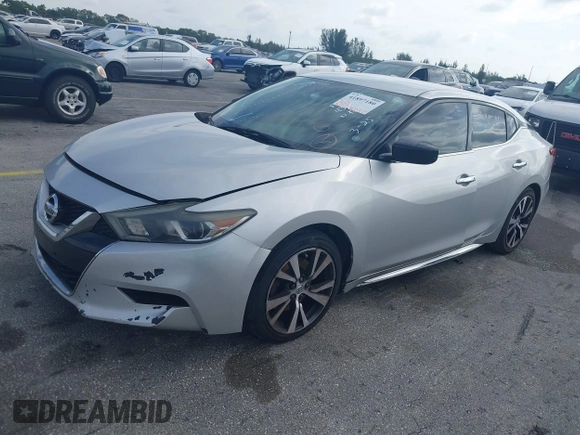 2016 Nissan Maxima SL with VIN 1N4AA6AP0GC433932, listed as a IAAI auction lot 41897180 with 91,871 mi miles and . Bid and sale history available at DreamBid. Image 2.