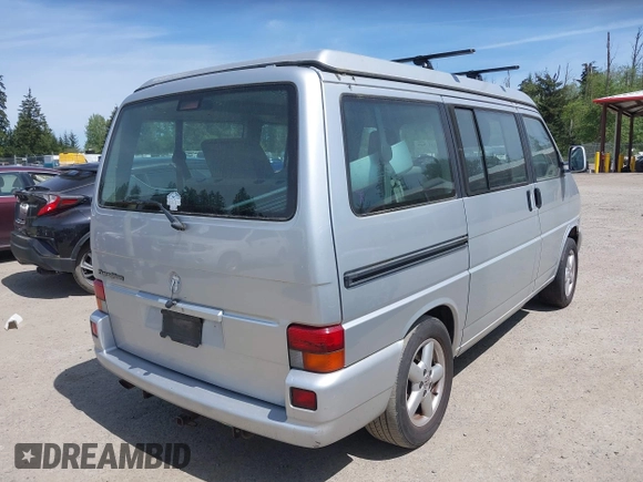 2003 Volkswagen EuroVan MV with VIN WV2NB47003H003131, listed as a IAAI auction lot 42157821 with 166,159 mi miles and . Bid and sale history available at DreamBid. Image 4.