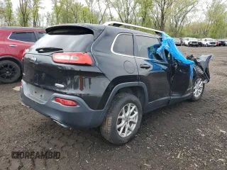 2015 Jeep Cherokee Latitude z VIN 1C4PJMCS2FW753051, wystawiony jako Copart lot #55651655 z przebiegiem 116 766 mil mil oraz Szkoda całkowita • Salvage title. Historia ofert i sprzedaży dostępna na DreamBid. Obrazek 3.