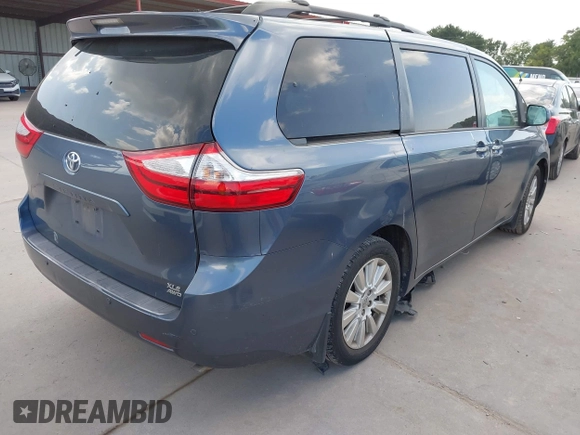 2015 Toyota Sienna Limited with VIN 5TDDK3DC8FS102900, listed as a IAAI auction lot 42449627 with 85,261 mi miles and . Bid and sale history available at DreamBid. Image 4.