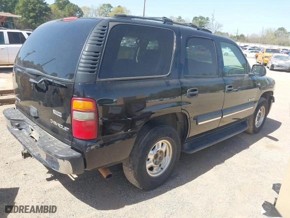 2003 Chevrolet Tahoe LT with VIN 1GNEC13Z03R318933, listed as a IAAI auction lot 41828148 with 192,851 mi miles. Bid and sale history available at carsss.com. Image 4.
