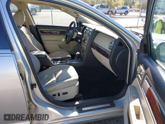2009 Lincoln MKZ with VIN 3LNHM26T49R603563, listed as a IAAI auction lot 41822110 with 140,504 mi miles and . Bid and sale history available at DreamBid. Image 5.