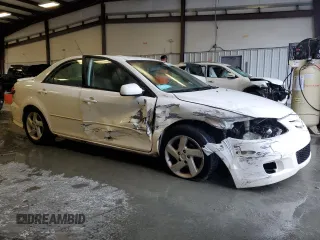 2004 Mazda 6 i with VIN 1YVFP80CX45N43521, listed as a Copart auction lot 73315234 with 182,697 mi miles and Salvage Title. Bid and sale history available at DreamBid. Image 4.