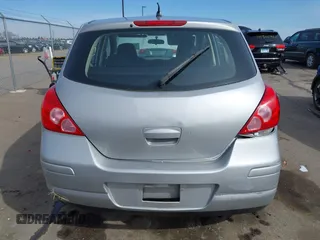 2009 Nissan Versa 1.8 SL with VIN 3N1BC13E49L388740, listed as a IAAI auction lot 41966343 with 125,780 mi miles. Bid and sale history available at carsss.com. Image 16.