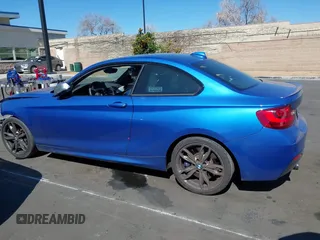 2015 BMW 2 Series M235i with VIN WBA1J7C59FV254140, listed as a IAAI auction lot 41642427 with 23,957 mi miles and . Bid and sale history available at carsss.com. Image 15.