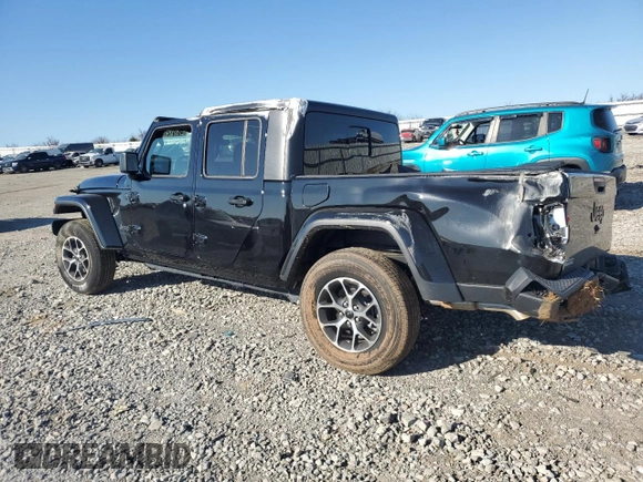 2024 Jeep Gladiator Sport S with VIN 1C6HJTAG3RL105132, listed as a Copart auction lot 48701215 with 576 mi miles and Salvage title. Bid and sale history available at DreamBid. Image 2.