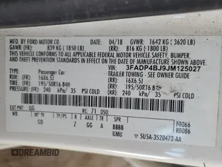 2018 Ford Fiesta SE with VIN 3FADP4BJ9JM125027, listed as a Copart auction lot 55129755 with 84,410 mi miles and Salvage Title. Bid and sale history available at DreamBid. Image 12.