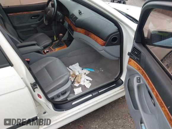 2000 BMW 5 Series 528i z VIN WBADM6341YGU07316, wystawiony jako IAAI lot #42436386 z przebiegiem Nie podano mil oraz . Historia ofert i sprzedaży dostępna na DreamBid. Obrazek 5.