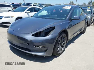 2023 Tesla Model 3 with VIN 5YJ3E1EA1PF545402, listed as a IAAI auction lot 42671354 with 37,948 mi miles and . Bid and sale history available at DreamBid. Image 2.