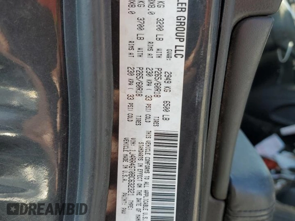 2011 Jeep Grand Cherokee 70th Anniversary with VIN 1J4RR4GT0BC632321, listed as a Copart auction lot 66772334 with 203,708 mi miles and Salvage Title. Bid and sale history available at carsss.com. Image 12.